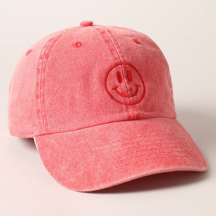 Red cap with a smiley face design 