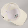 White cap with embroidered design