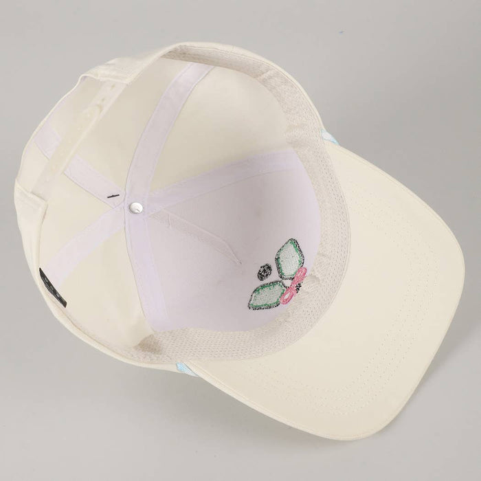 White cap with embroidered design