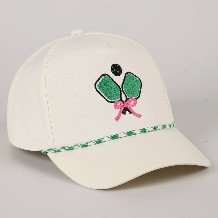 Beige cap with pickleball paddle and pink bow design 