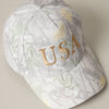 Cap with gold 'USA' text and camo pattern 
