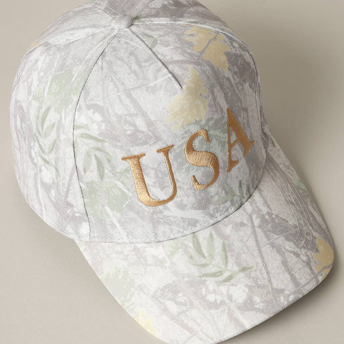 Cap with gold 'USA' text and camo pattern 