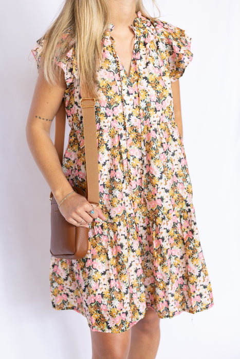 floral flutter sleeve dress and long tassels with brown bag