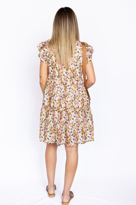 floral flutter sleeve dress and long tassels with braided brown sandals and brown bag