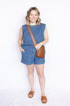 Washed Denim Sleeveless Top and denim shorts with brown open sandals and brown bag