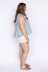 white high waisted shorts with light blue blouse