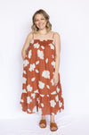 Rust Cloud Print Smocked Mini Dress with brown open sandals
