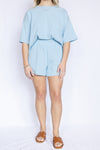 Light blue Striped Cropped Top & Shorts Set with brown open sandals