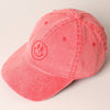 Red cap with a smiley face design 