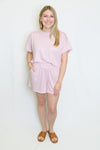 Woman wearing a pink outfit set