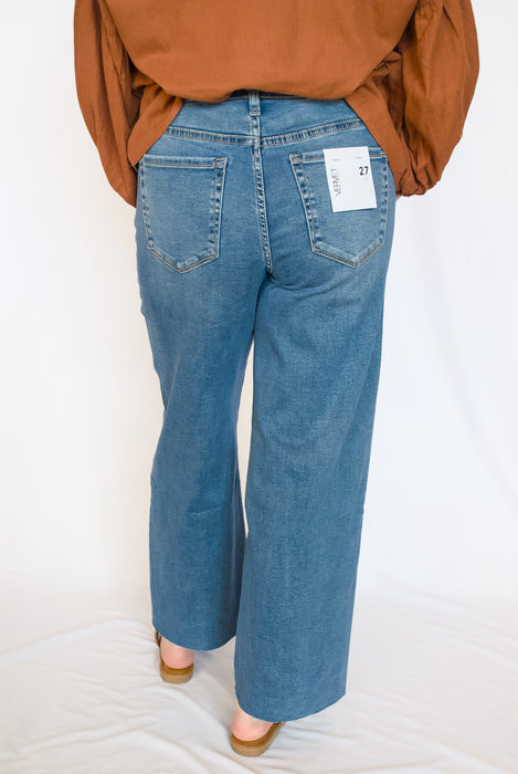 High Rise Cropped Wide Leg Jeans | Medium Wash Raw Hem Denim