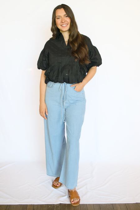 Black bubble blouse with drawstring jeans