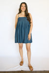 Woman wearing a blue dress 