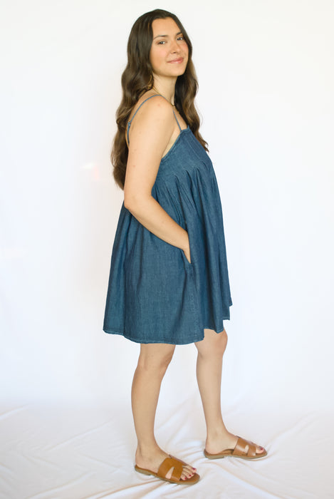 Woman wearing a blue dress 