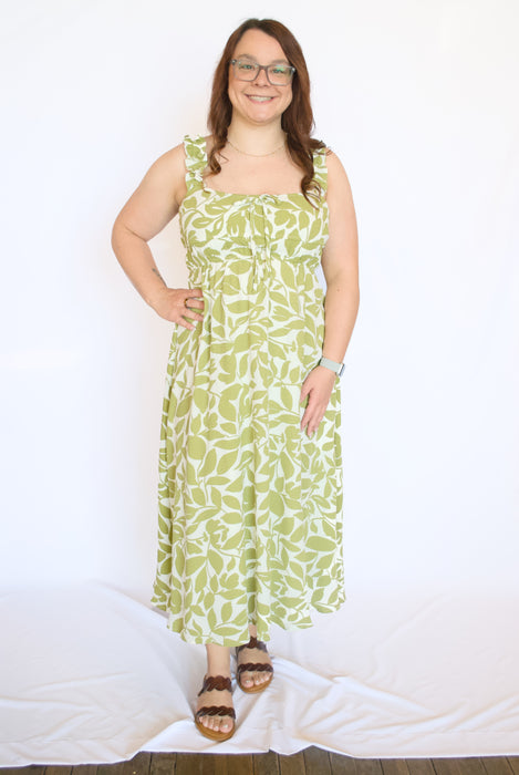 Woman wearing a green floral dress 
