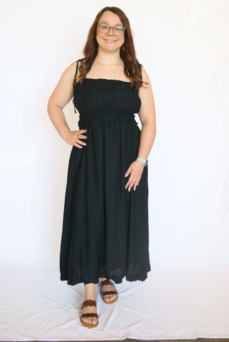 Woman wearing a black dress 