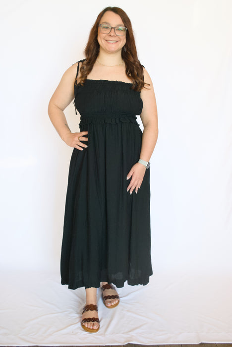 Woman wearing a black dress 