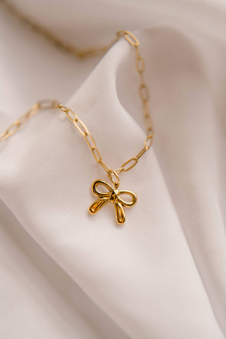 Colossians 1:17 Bow Necklace
