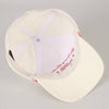 White cap with red text 
