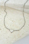 Silver necklace with a heart-shaped pendant 